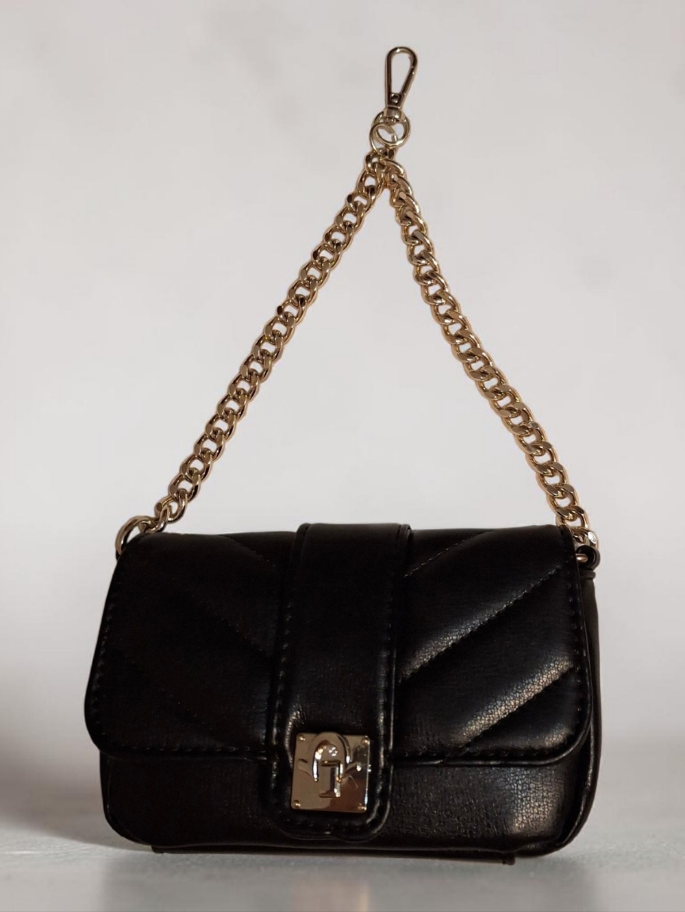 True Religion black quilted mini handbag with gold chain NWOT